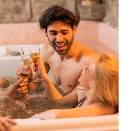 Group of adults using their champagne flutes to cheers.