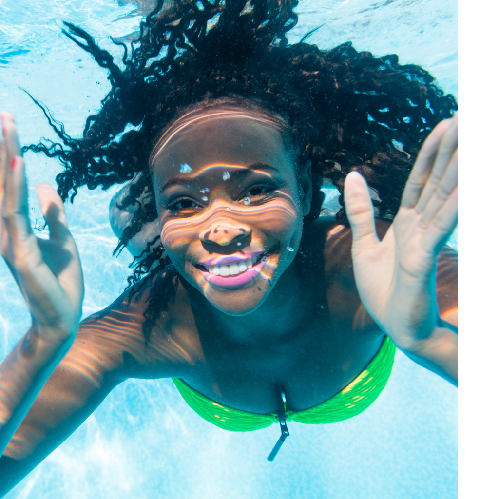 A woman poses underwater for a cool photo