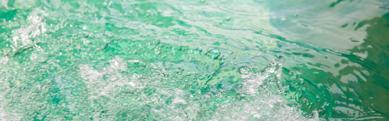 Overhead shot of green hot tub water